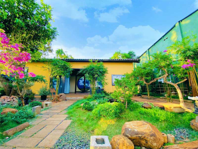 Căn nhà nhỏ xinh với sân vườn tuyệt đẹp dành cho cha mẹ an dưỡng tuổi trung niên